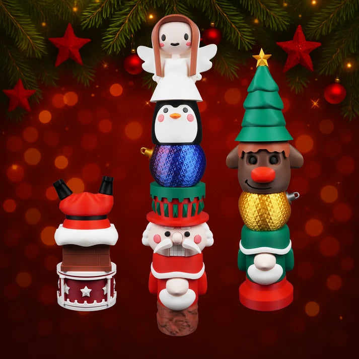 Christmas Spirit Poles — Santa in chimney, angel and penguin stack, reindeer with Christmas tree hat